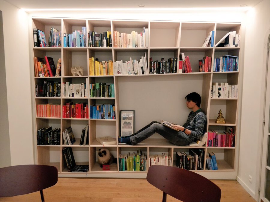 Me in our new bookshelf.